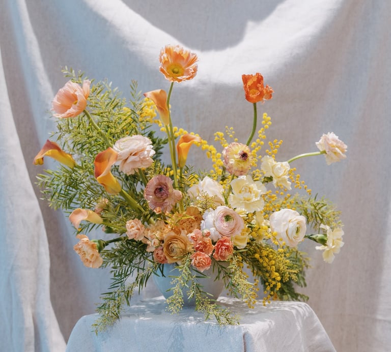 composition de buffet dégradé de jaune et orange. Workshop Désirée Fleurs