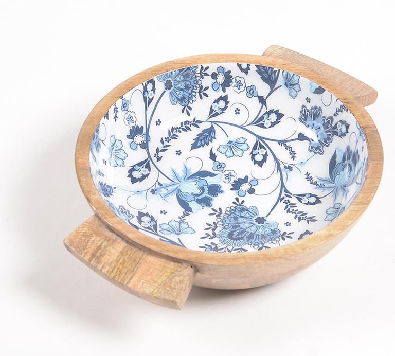 a blue and white wooden bowl for serving