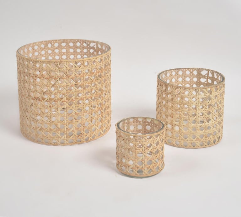 a set of three wickers with a basket weave cane and jute glass candle holder