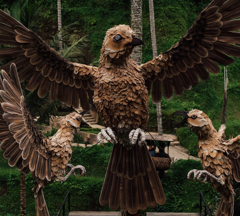 a statue of a bird with wings spread out