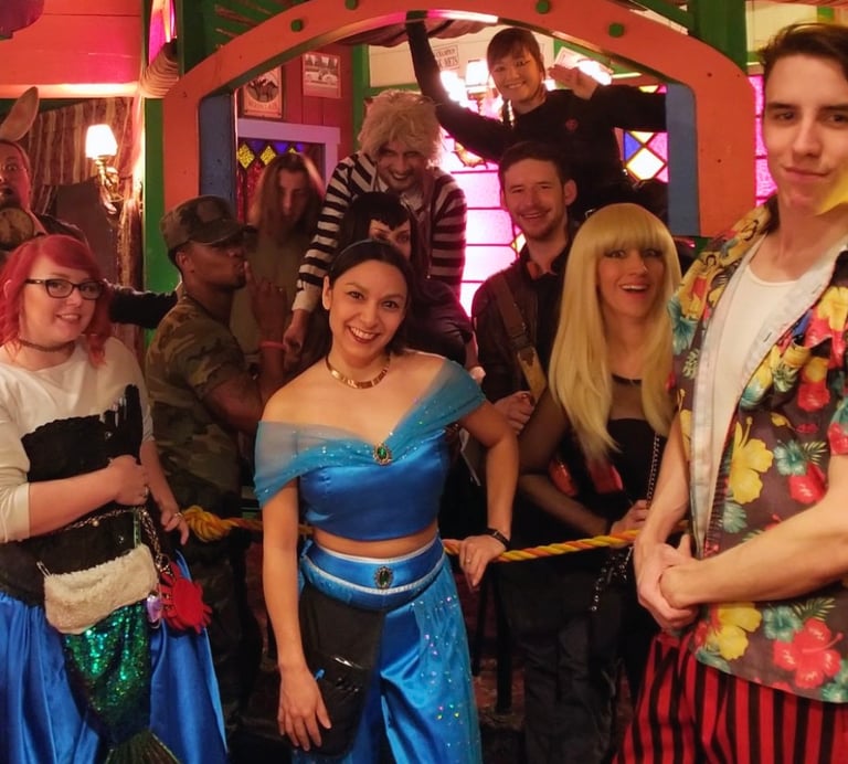 a group of people dressed in costumes for a costume party