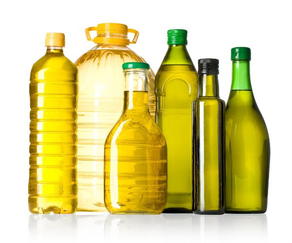 a variety of bottles of cooking oil