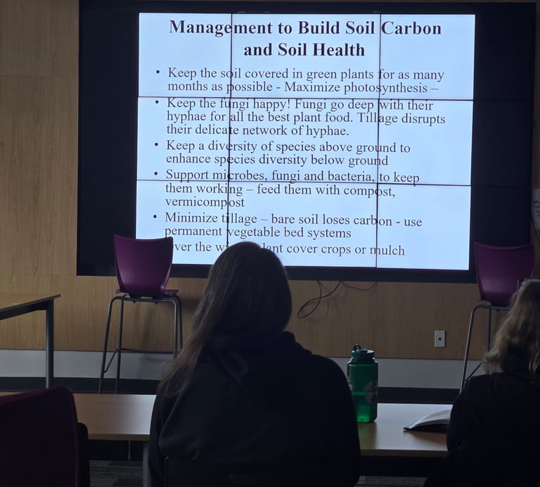 Presentation slide showing management practices to build soil carbon and soil health during a workshop.