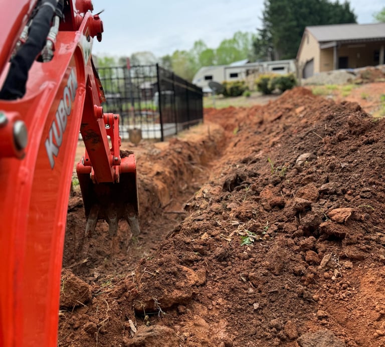 Excavation and trenching service in Newton NC for drainage installation and foundation preparation