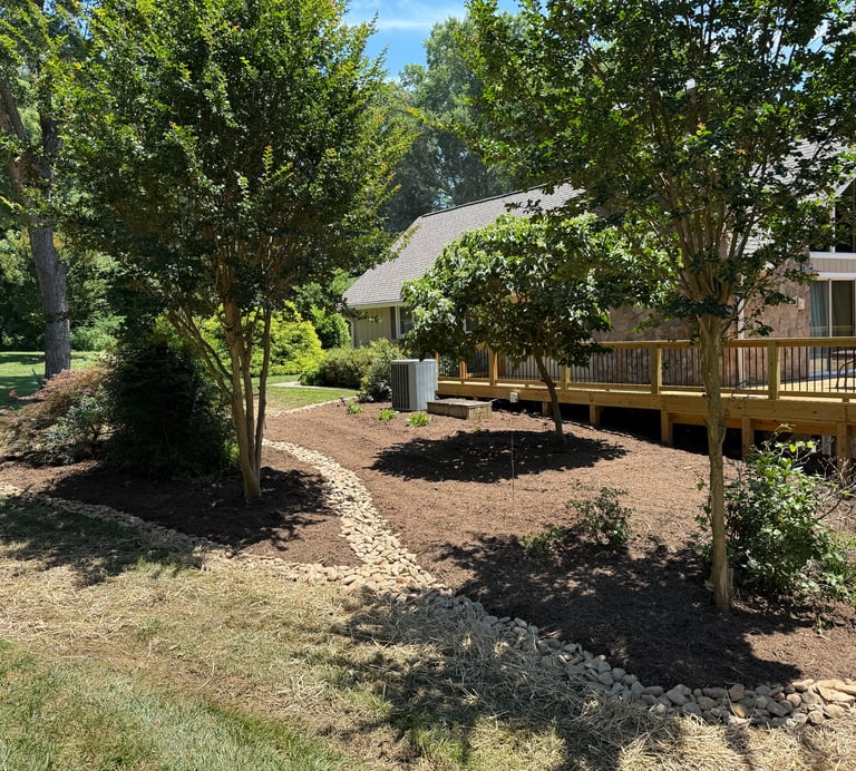 Mulch bed edging and installation in Hickory NC creating clean defined landscape borders