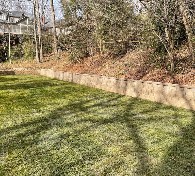 Segmental block retaining wall in Hickory NC designed for erosion control and yard protection