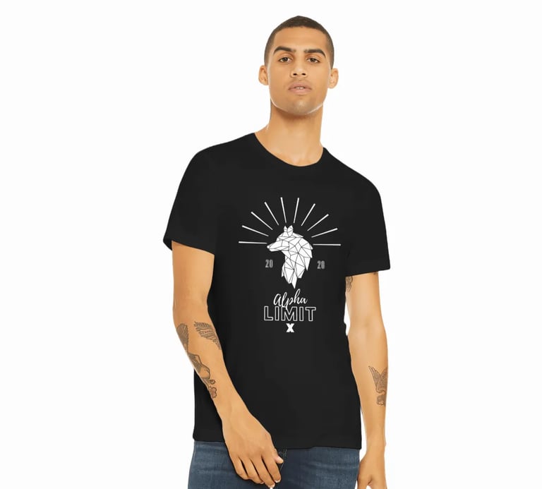 a man wearing a black t - shirt with a white wolf head