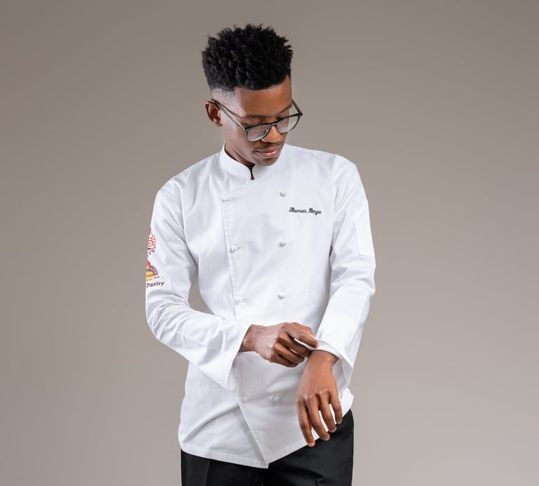 a man in a white shirt and black pants