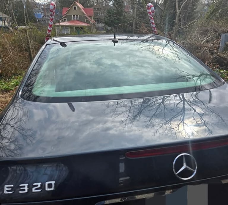 Back of black Mercedes-Benz E320 after ignition repair service in Black Mountain, NC