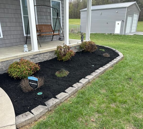 fresh mulch in landscaping bed