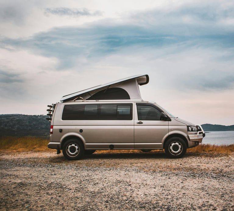 Modern campervan near lake