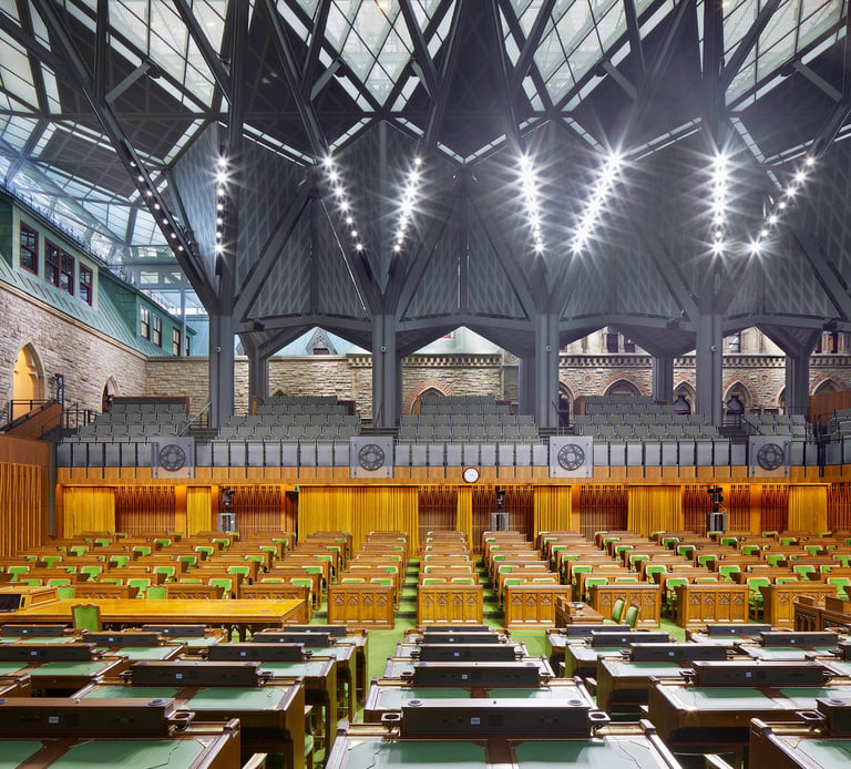 a large room with a lot of wooden tables and chairs