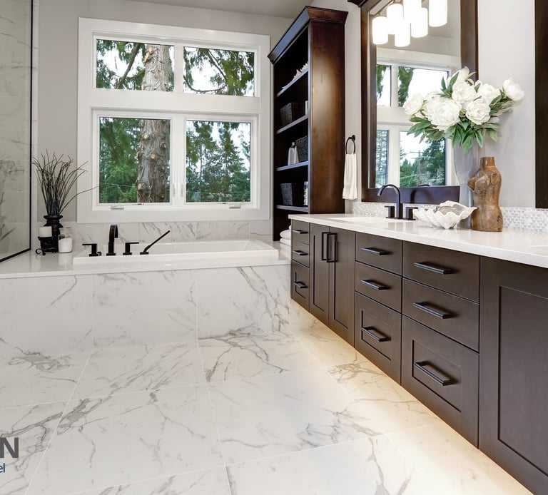 Modern bathroom with walk‑in glass shower, large vanity, and contemporary tile design