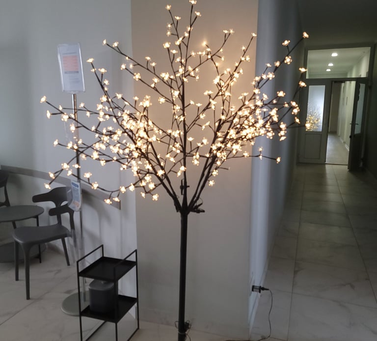 a tree with white lights on it