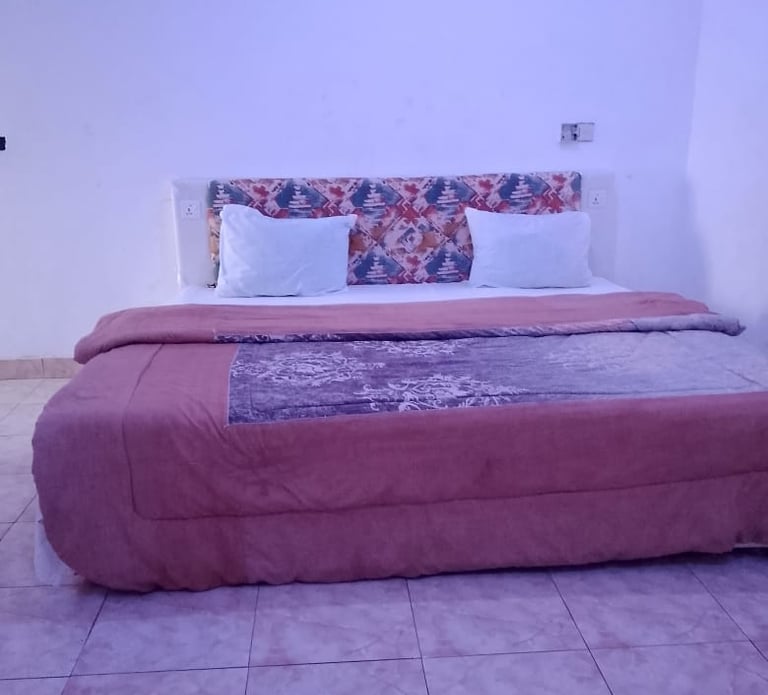 Bedroom at Denco Lodge Nugua for only GHS 200 /night, clean bathrooms and fully equipped for leisure