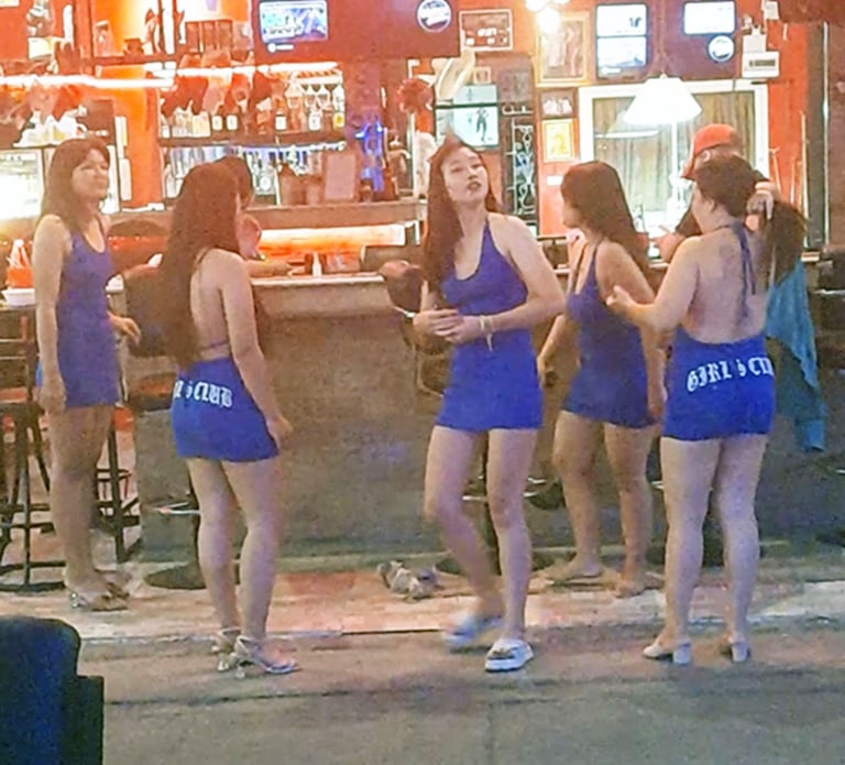 Thai women oustside bar on Soi 80 in Hua Hin
