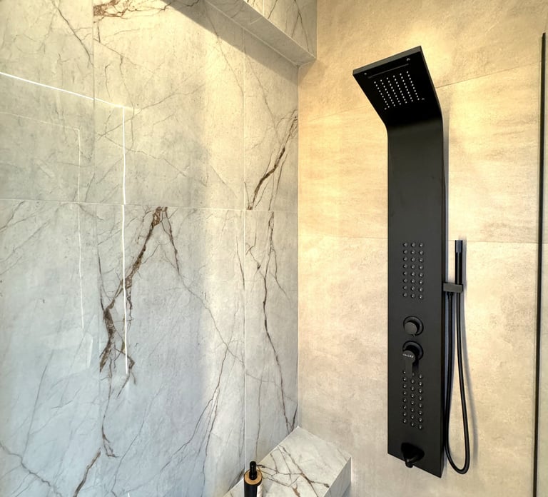 Ground Floor - Full bathroom with heated floors, waterfall shower and natural ventilation.