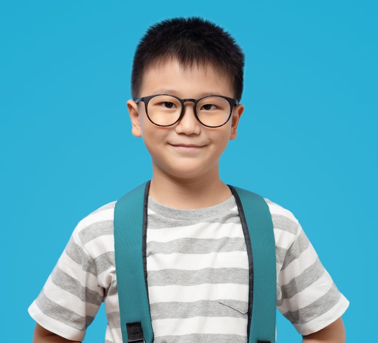 Little boy wearing children's designer frame