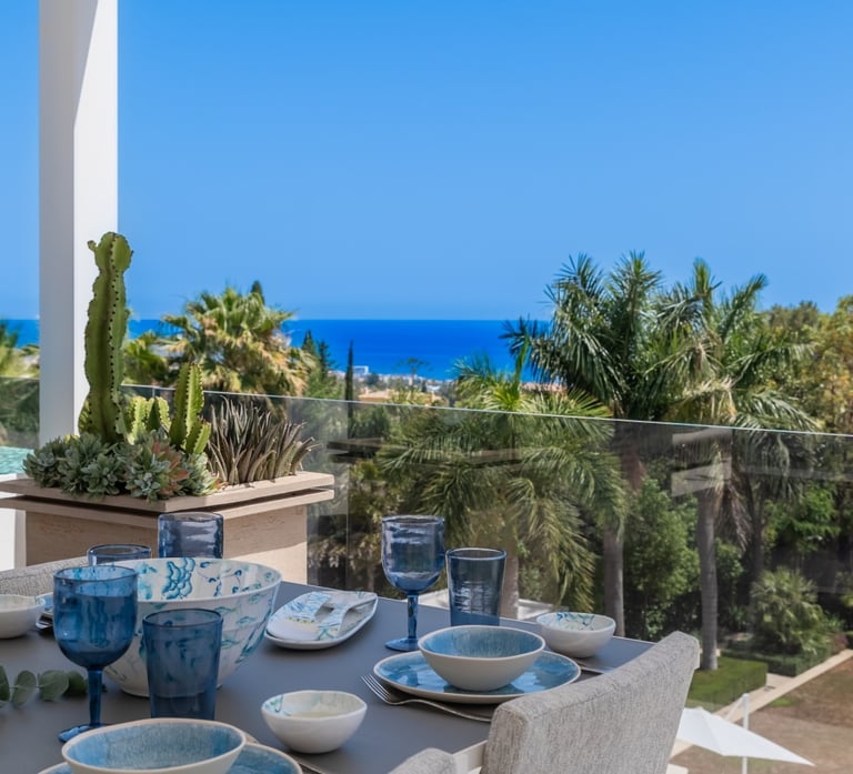 Rooftop dining area with sea views at Villa Serenity