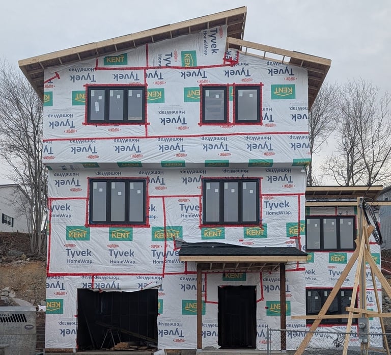 A 4-bedroom, 3-storey custom home built with SIP panels, currently under construction.
