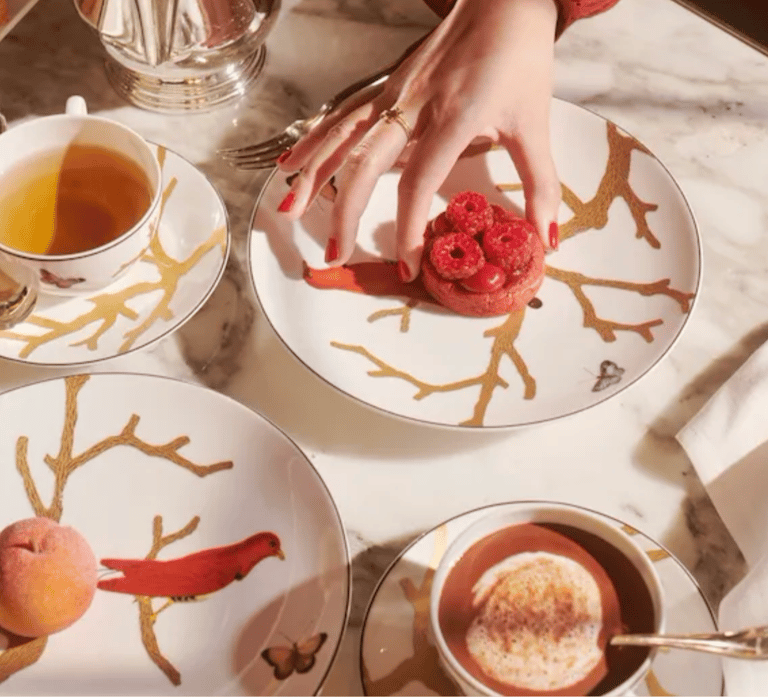 Luxury tea service with desserts at Le Meurice in Paris.