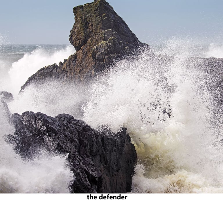 a rock formation at high tide in storm kathleen