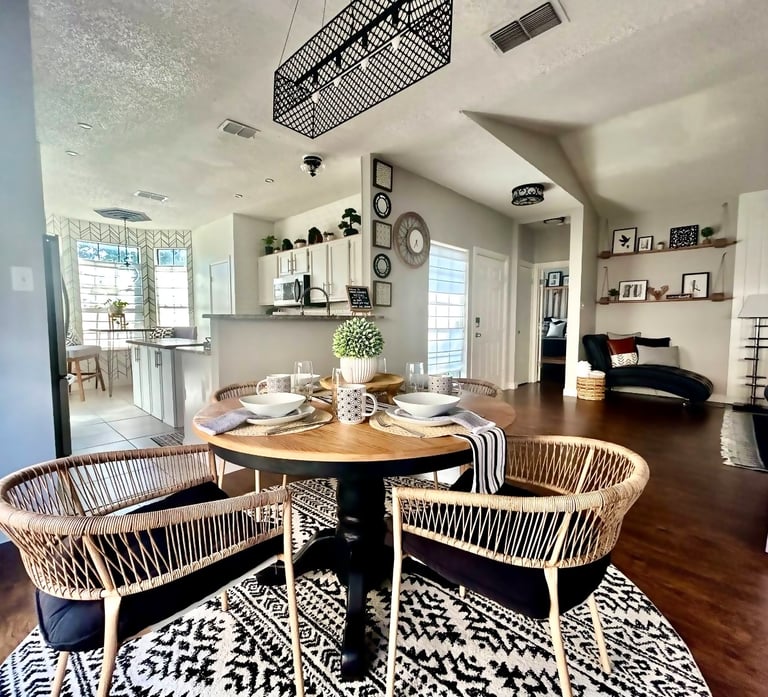 Luxury vacation rental photo gallery – bright dining room with natural light and cozy boho-inspired