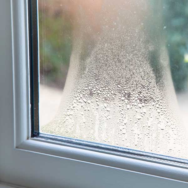 picture of a double glazed sealed unit with condensation between the glass panes