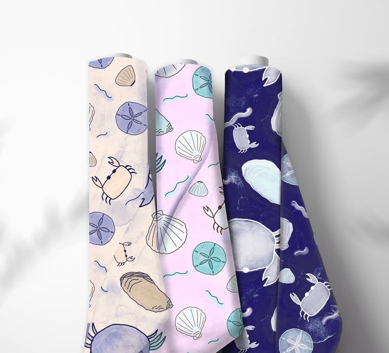 fabric rolls with seashells and crabs on them