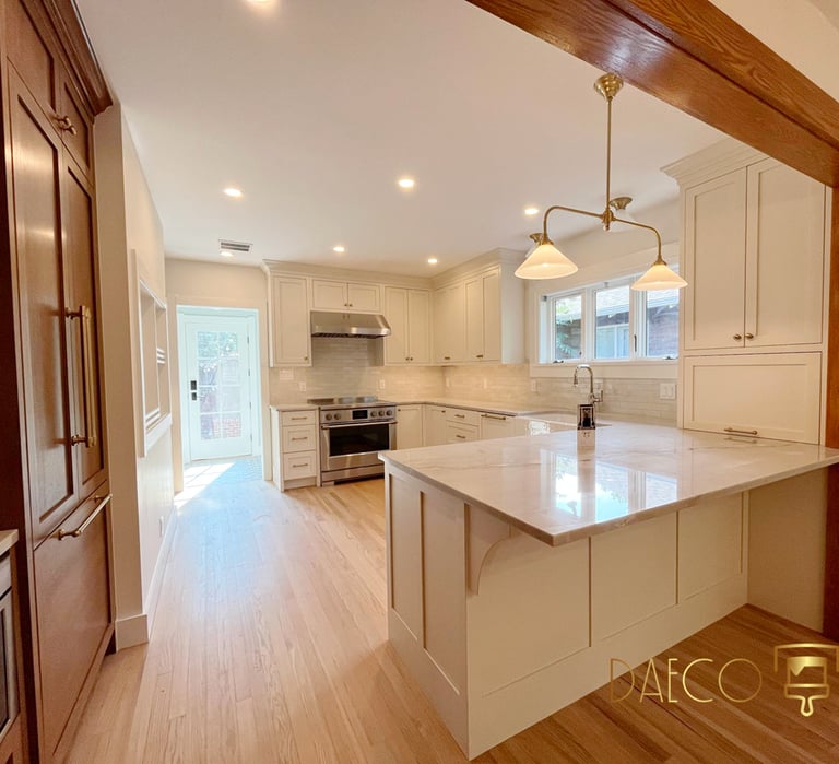 a kitchen with a large island and a large island