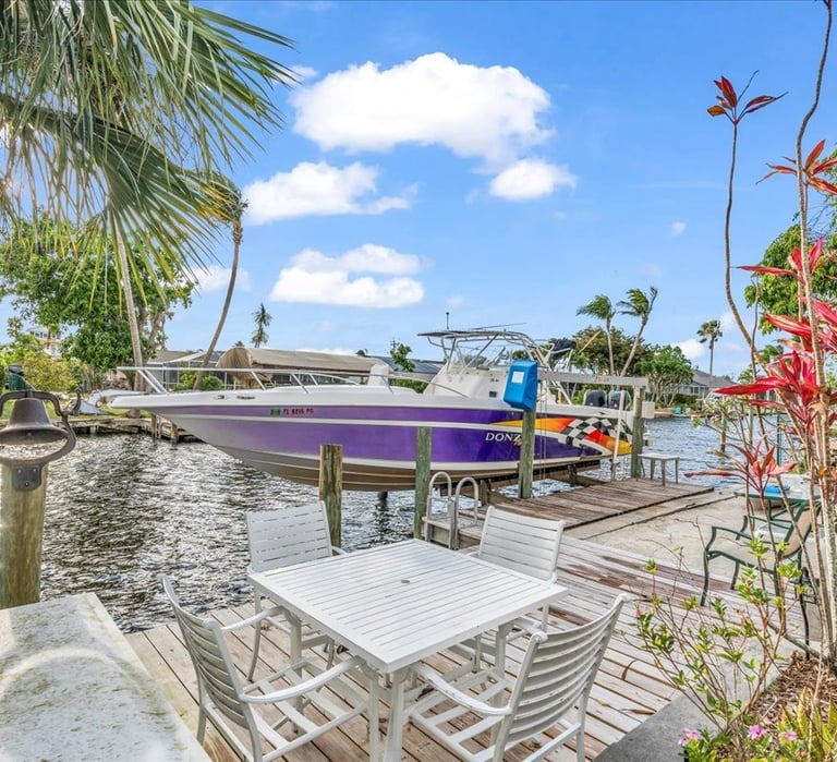 Boat lifted on a dock in Cape Coral