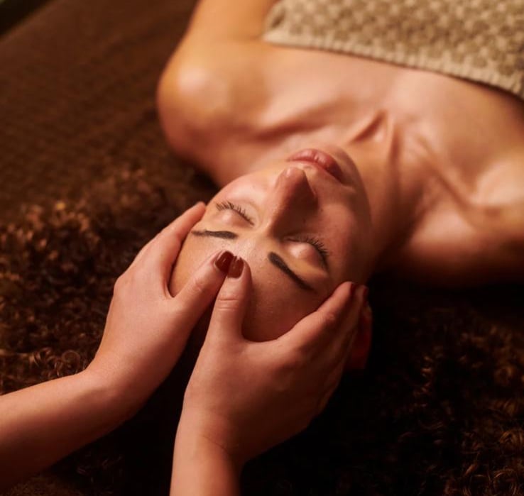 Professional head and shoulder massage treatment at a luxury Bali spa