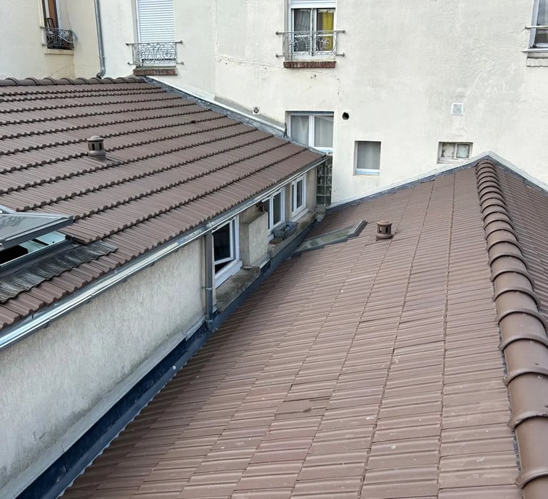 Travaux de couverture réalisés par MF Couverture à Puteaux (92) - Pose de toiture en tuiles et travaux de zinguerie