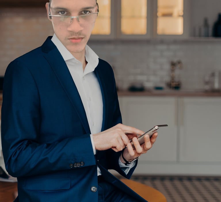 Businessman holding a smartphone