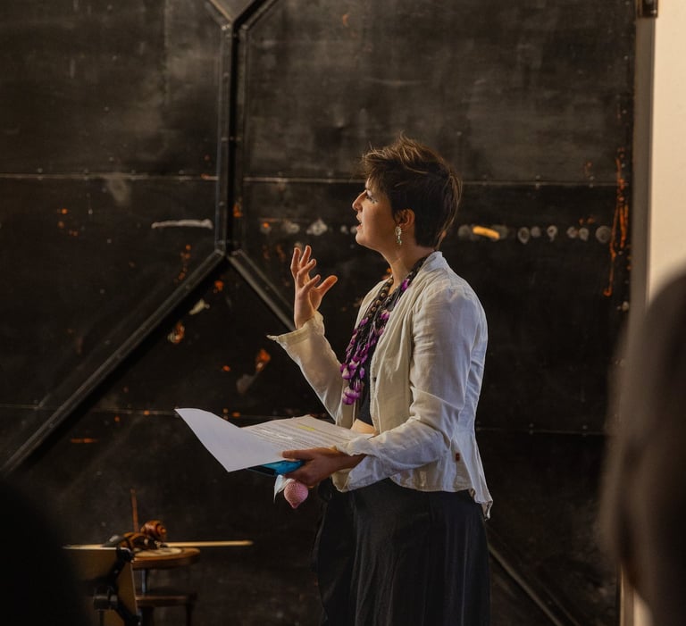 Dorchess speaking at an Awe Academy art experience