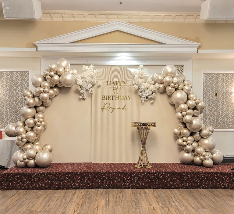 Elegant neutral themed balloon garland with gold and beige
