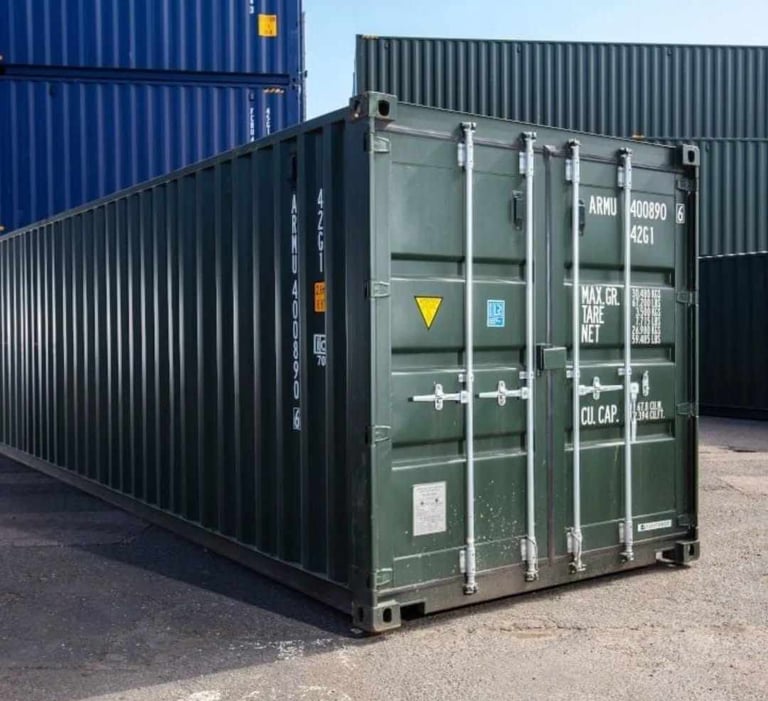 A 40ft dark green steel shipping container for logistics and cargo transport.