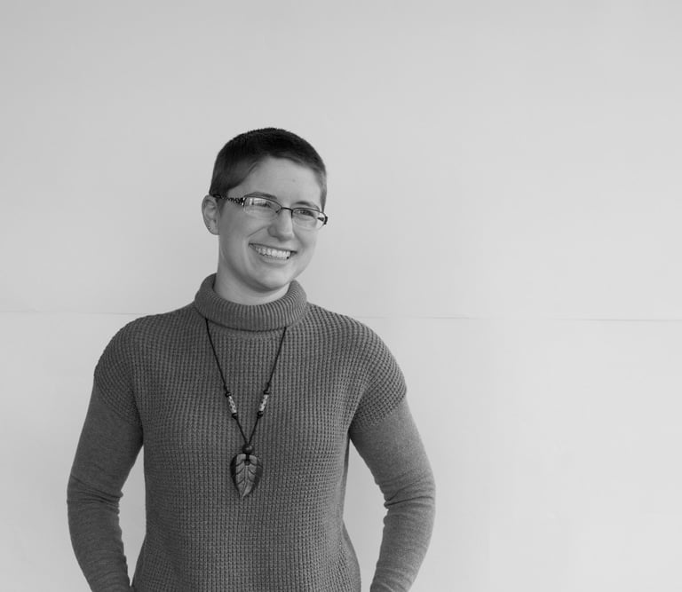 Photo of Melody smiling with an open posture