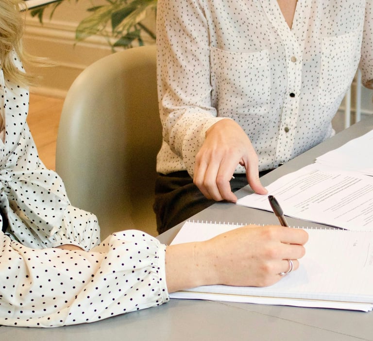 Two women sitting in a consulting and having in conversation in nutritional advice.