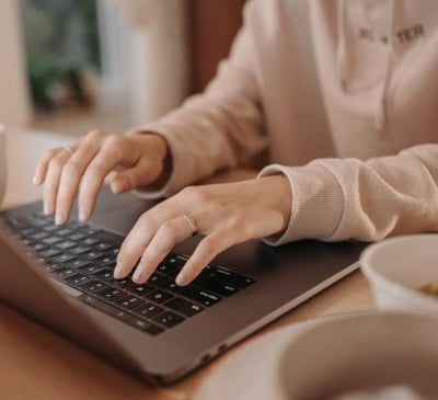 Bookkeeper using laptop