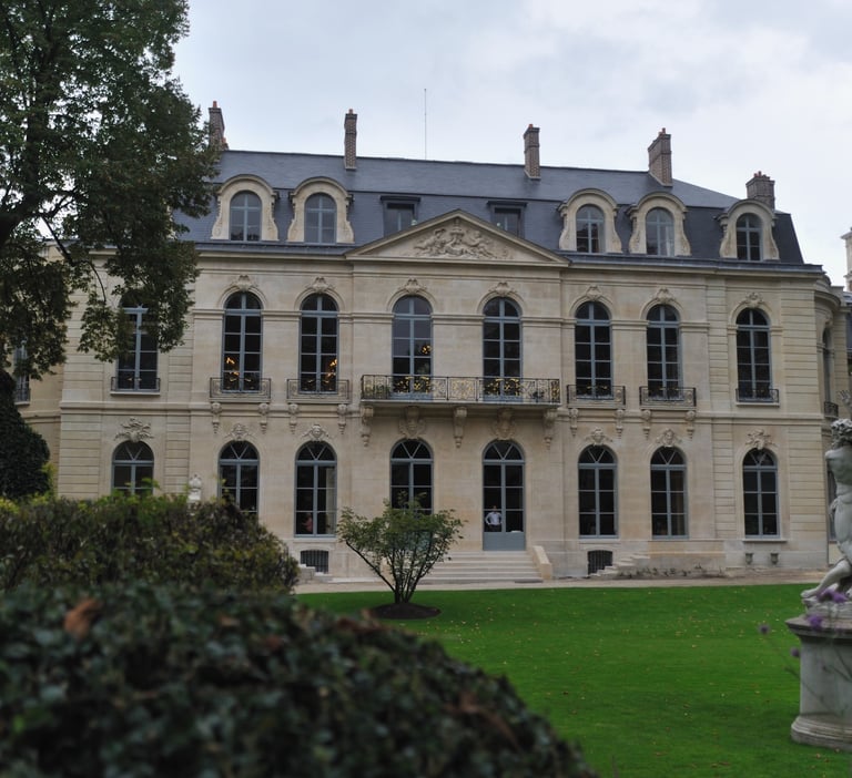 Elegant facade of the Musee Rodin in Paris with classic French architecture and garden sculptures.