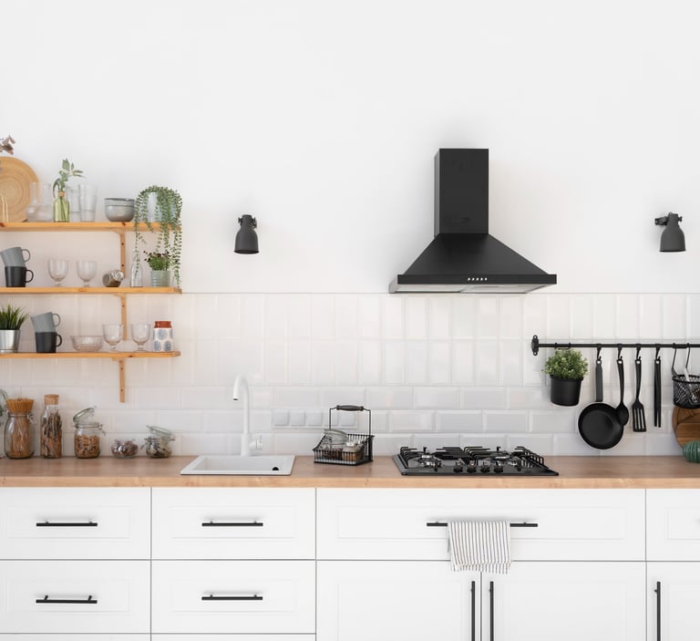 a kitchen with a stove top and shelves with pots and utensils