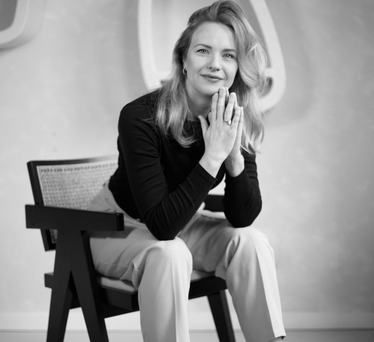 a woman sitting on a chair in a chair