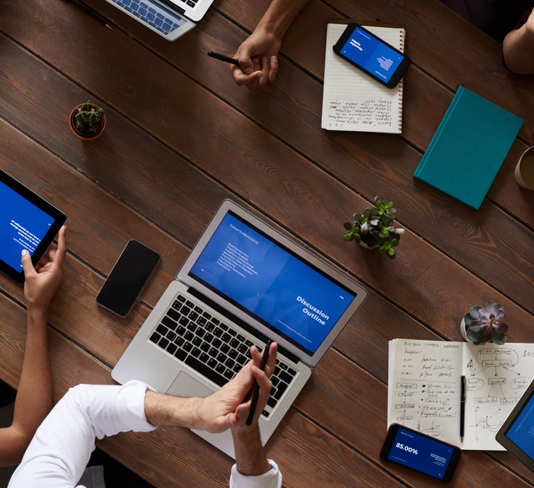 Business professionals reviewing HR policies and documentation