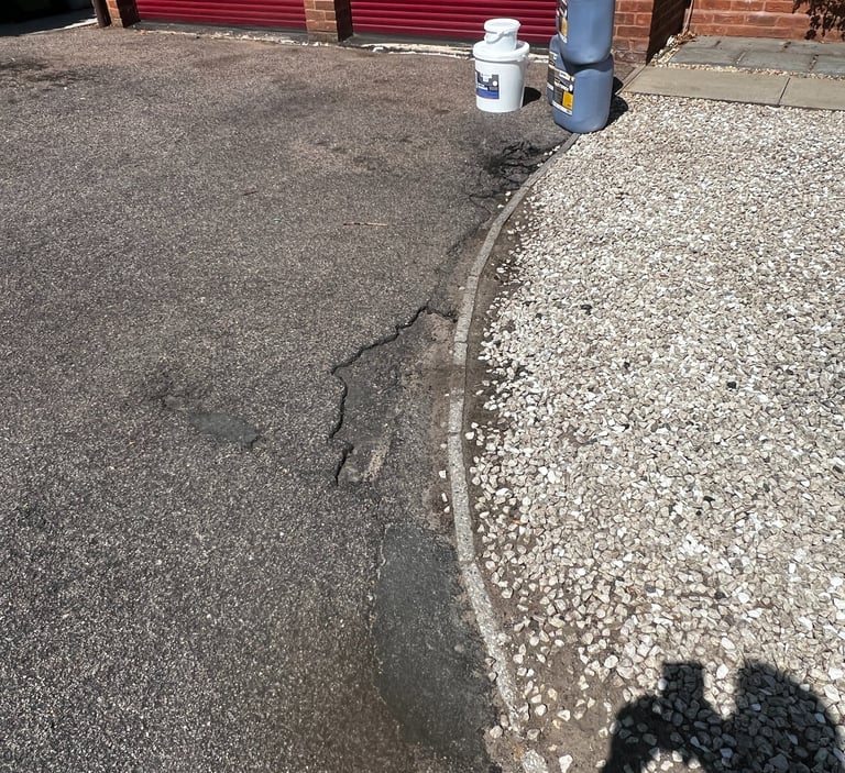 <img src="tarmac-driveway.jpg" alt="Old driveway before restoration" />