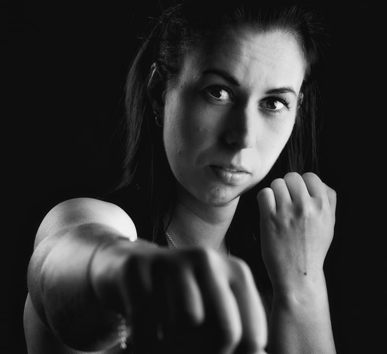 potrait ofa woman with a fist 