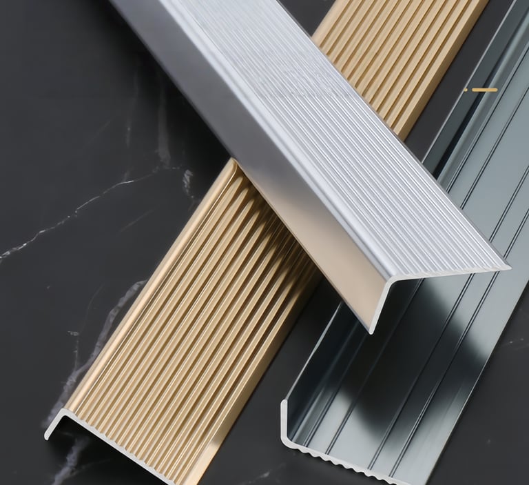 Aluminum metal floor transition strips in gold, silver and gray colors for interior flooring decoration