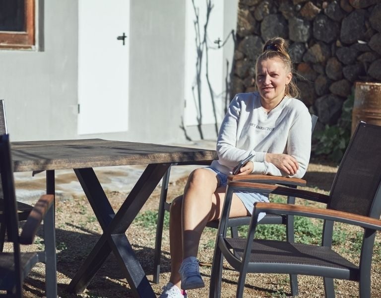 Mediaescort founder Anastasia Safronova oversees the client's filming process.