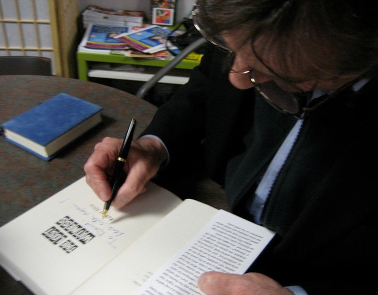 Photo of Robert Ellis, bestselling author signing 'The Lost Witness' at the Mysterious Galaxy in San Diego California.