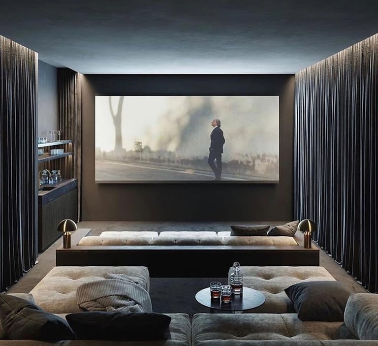 Bespoke London home cinema with tiered seating, starlight ceiling, and Dolby Atmos speakers